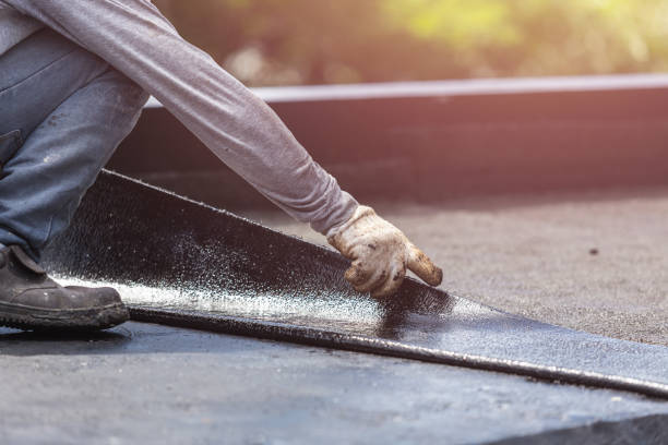 Professional Basement Waterproofing technician working in Danville, OH